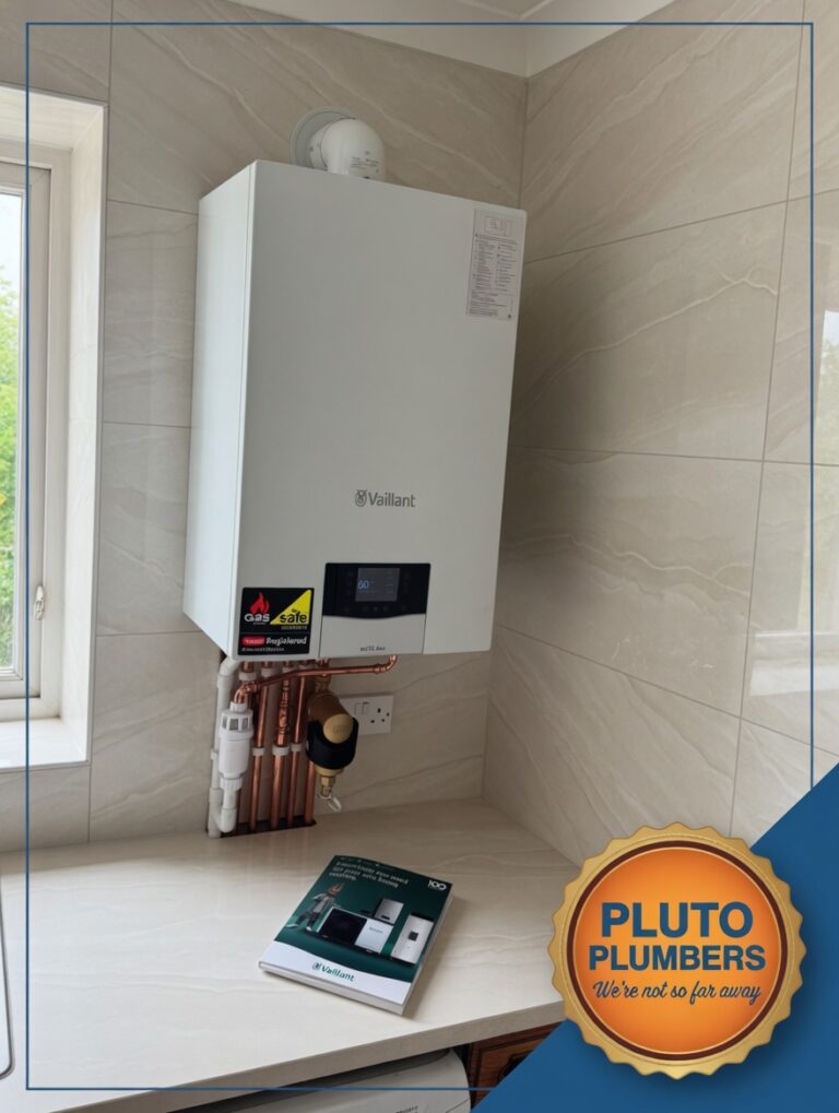 Vaillant Approved Gas Safe engineer repairing a Vaillant ecoTEC Plus boiler in Rickmansworth